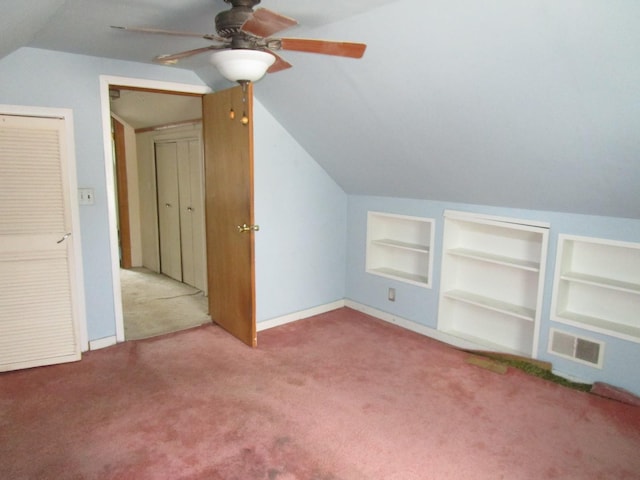 786 N Van Auken St, Elmhurst, IL 60126 - additional living space with built in features, carpet floors, vaulted ceiling, ceiling fan, and baseboards