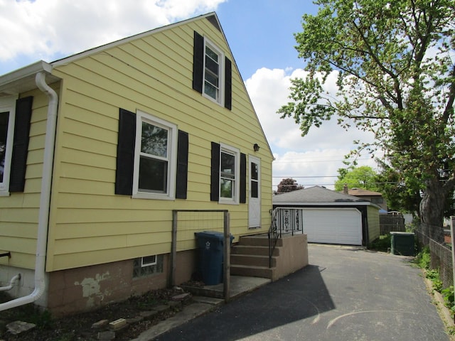 786 N Van Auken St, Elmhurst, IL 60126 - view of front of home featuring a garage and an outbuilding