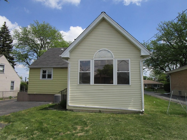786 N Van Auken St, Elmhurst, IL 60126 - rear view of house featuring central AC