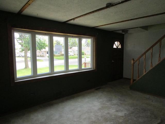 786 N Van Auken St, Elmhurst, IL 60126 - foyer with stairs, a textured ceiling, and carpet