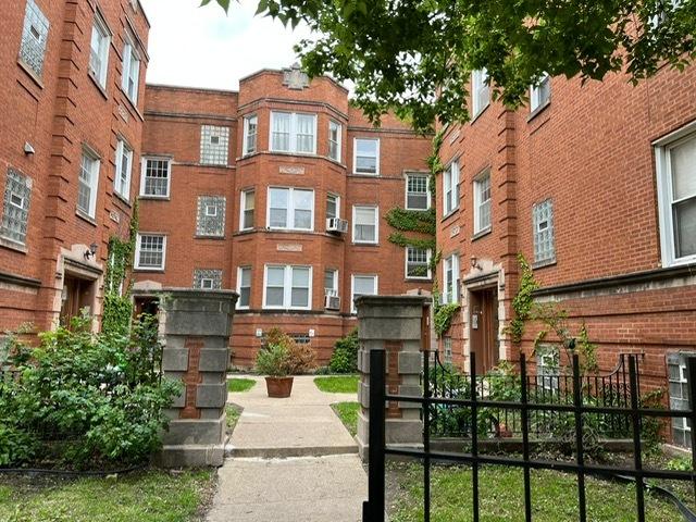 2300 W Granville Ave Unit G, Chicago, IL 60659 - view of building exterior with central AC unit