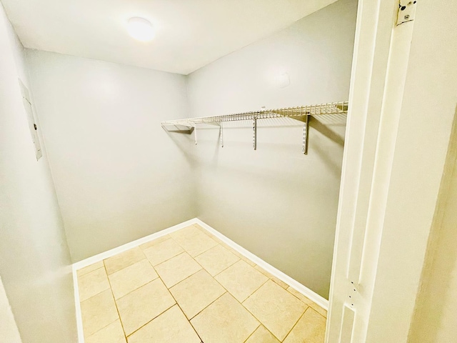 2300 W Granville Ave Unit G, Chicago, IL 60659 - spacious closet with light tile patterned floors and electric panel
