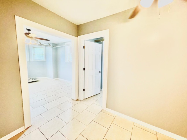 2300 W Granville Ave Unit G, Chicago, IL 60659 - corridor featuring light tile patterned floors and baseboards