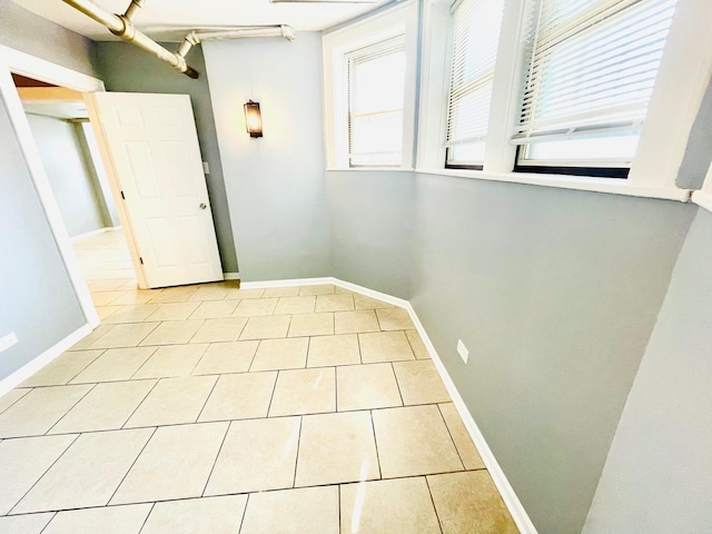 2300 W Granville Ave Unit G, Chicago, IL 60659 - tiled spare room with baseboards