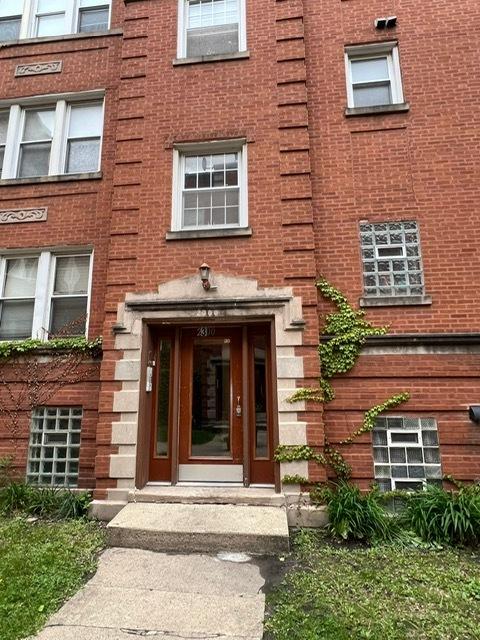 2300 W Granville Ave Unit G, Chicago, IL 60659 - entrance to property with brick siding