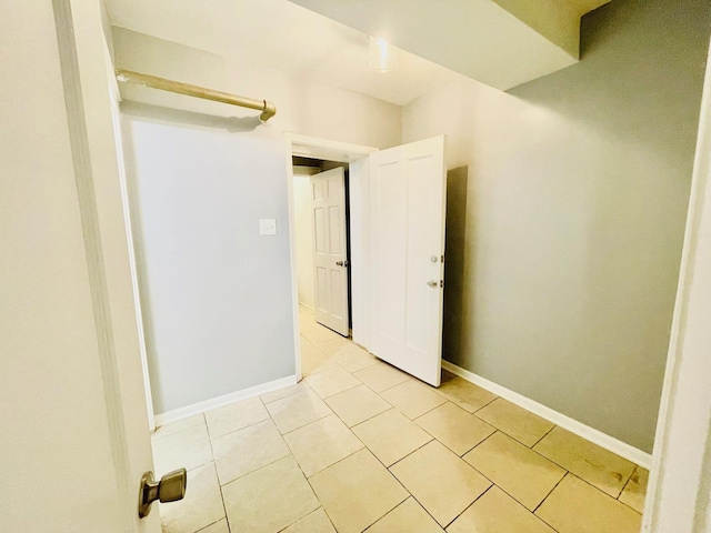 2300 W Granville Ave Unit G, Chicago, IL 60659 - spare room featuring light tile patterned floors and baseboards