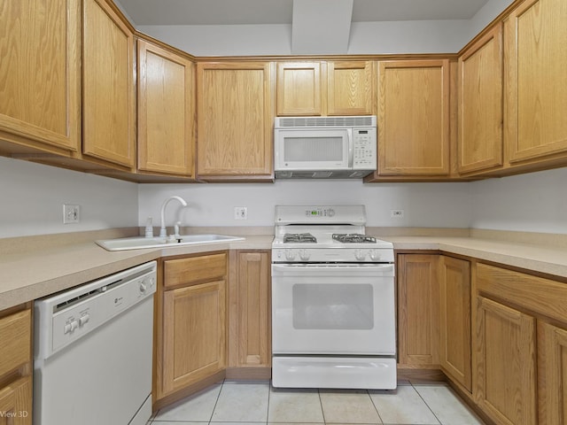 5417 S Melvina Ave Unit 203, Chicago, IL 60638 - kitchen featuring white appliances, a sink, light countertops, and light tile patterned floors