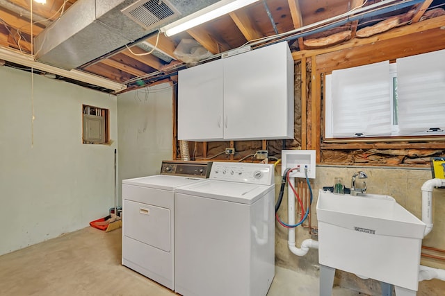 8 E Eureka St, Lemont, IL 60439 - laundry area with washing machine and dryer, cabinet space, and electric panel