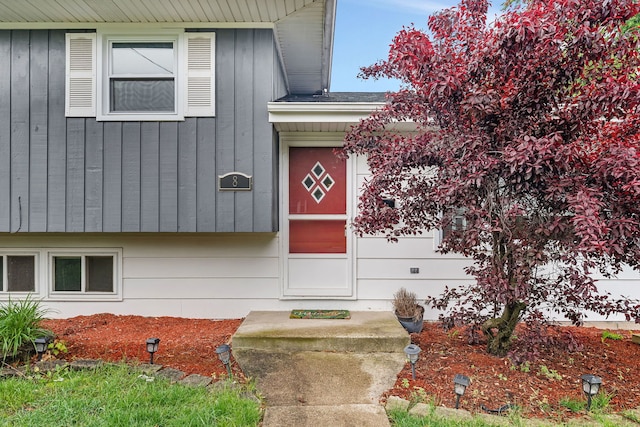 8 E Eureka St, Lemont, IL 60439 - doorway to property with board and batten siding