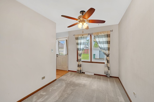 8 E Eureka St, Lemont, IL 60439 - unfurnished room featuring a ceiling fan, baseboards, and carpet