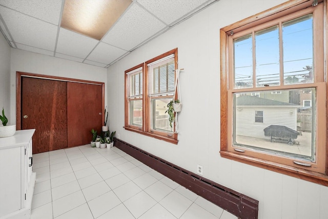 5331 W Schubert Ave, Chicago, IL 60639 - corridor featuring a paneled ceiling and healthy amount of natural light