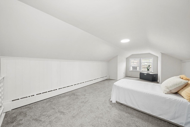 5331 W Schubert Ave, Chicago, IL 60639 - bedroom featuring a baseboard radiator, lofted ceiling, and carpet floors