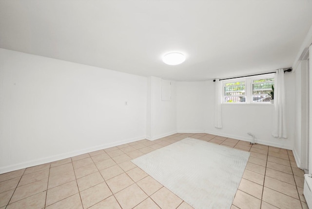 5331 W Schubert Ave, Chicago, IL 60639 - spare room with light tile patterned floors