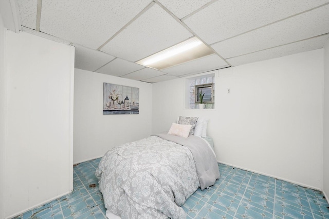 5331 W Schubert Ave, Chicago, IL 60639 - bedroom featuring a drop ceiling and tile patterned floors