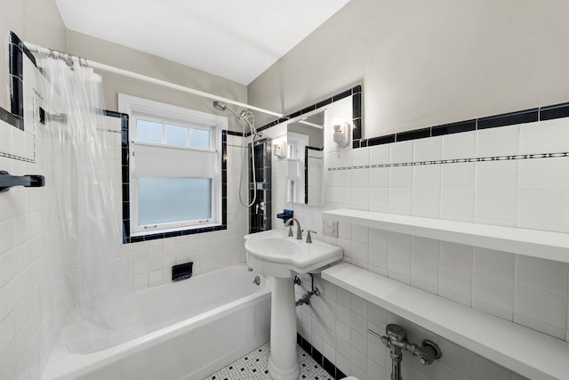 213 N Marion St Unit 1C, Oak Park, IL 60302 - bathroom featuring tile walls and shower / tub combo