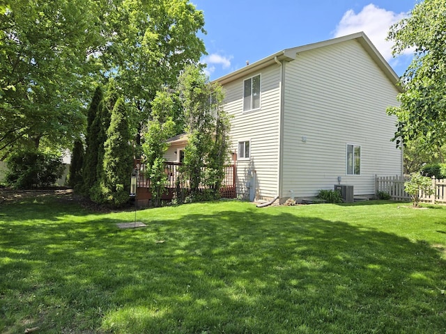 997 W Briarcliff Rd, Bolingbrook, IL 60440 - view of side of home with a deck and a central air condition unit