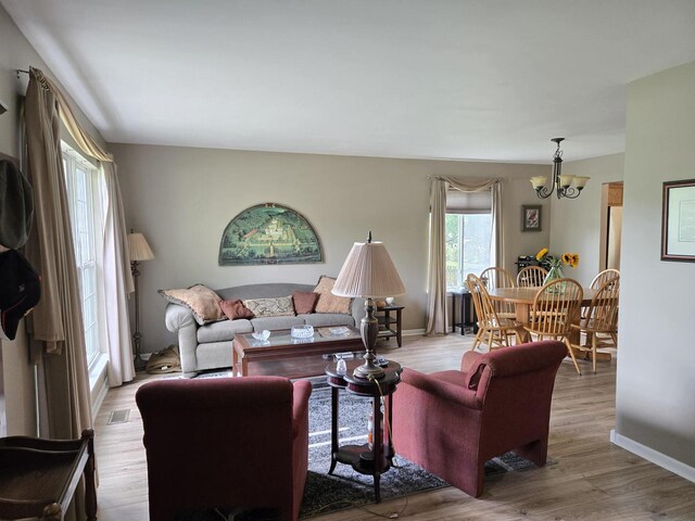 997 W Briarcliff Rd, Bolingbrook, IL 60440 - living room with a chandelier and wood finished floors