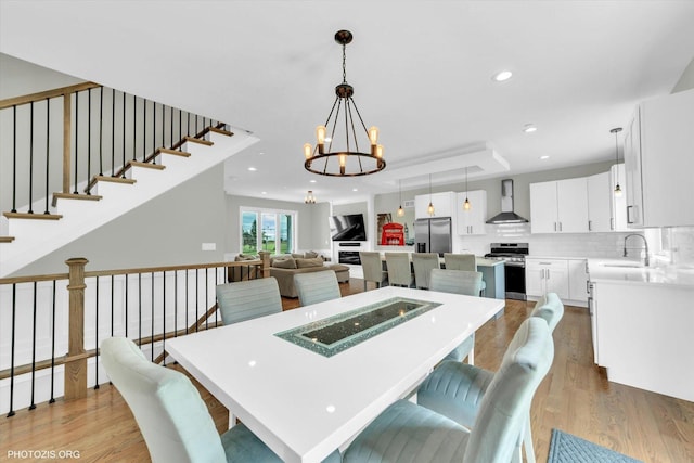 7218 S 78th Ave, Bridgeview, IL 60455 - dining space featuring light wood finished floors, a chandelier, and recessed lighting