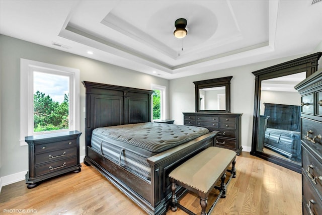 7218 S 78th Ave, Bridgeview, IL 60455 - bedroom with a raised ceiling, light wood finished floors, baseboards, ceiling fan, and recessed lighting
