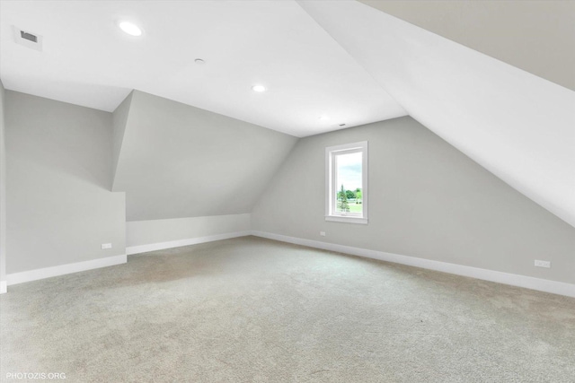 7218 S 78th Ave, Bridgeview, IL 60455 - additional living space with vaulted ceiling, baseboards, carpet, and recessed lighting