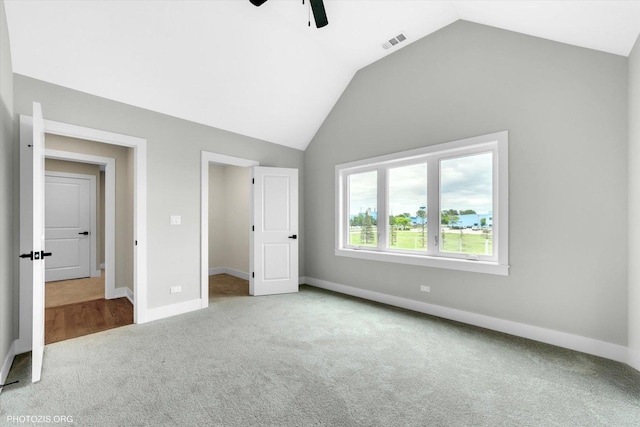 7218 S 78th Ave, Bridgeview, IL 60455 - unfurnished bedroom featuring carpet flooring, vaulted ceiling, baseboards, and ceiling fan