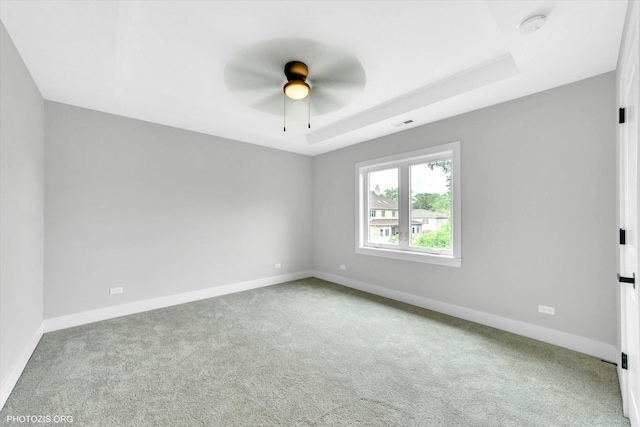 7218 S 78th Ave, Bridgeview, IL 60455 - carpeted empty room with baseboards, ceiling fan, a smoke detector, and a tray ceiling