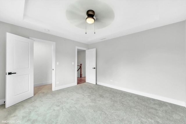 7218 S 78th Ave, Bridgeview, IL 60455 - unfurnished bedroom featuring carpet, baseboards, and a ceiling fan