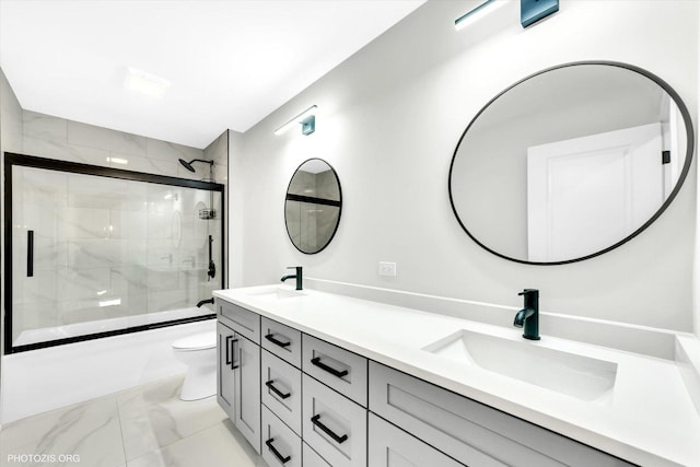 7218 S 78th Ave, Bridgeview, IL 60455 - bathroom with toilet, marble look tiles, double vanity, and bath / shower combo with glass door
