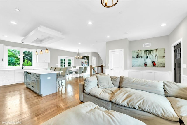 7218 S 78th Ave, Bridgeview, IL 60455 - living area with recessed lighting, light wood-style flooring, and a chandelier