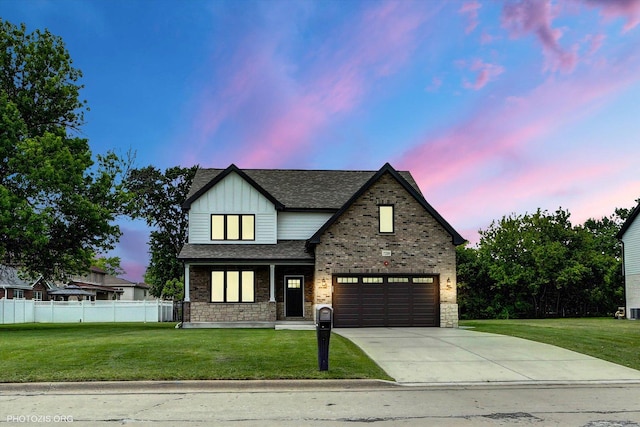 7218 S 78th Ave, Bridgeview, IL 60455 - view of front of house with driveway, board and batten siding, roof with shingles, stone siding, and covered porch
