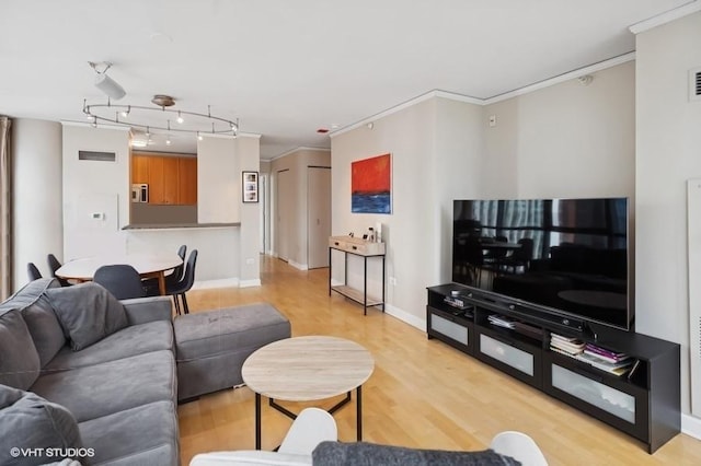 201 N Westshore Dr Unit 2608, Chicago, IL 60601 - living room featuring light wood-style floors, crown molding, and baseboards