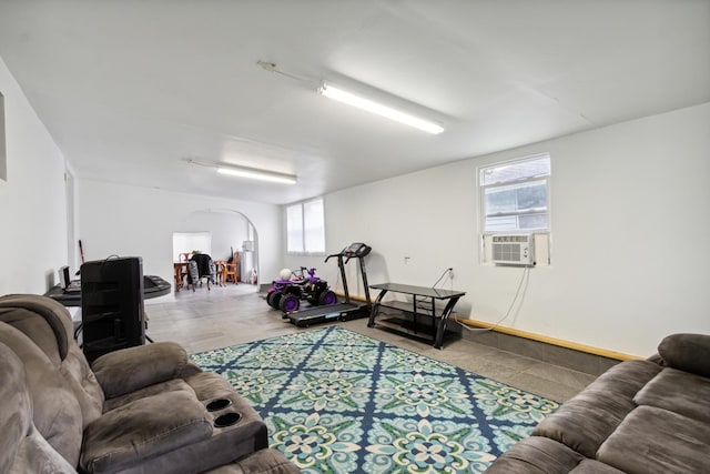 1818 W 9th St, Dixon, IL 61021 - living room featuring arched walkways, healthy amount of natural light, and cooling unit