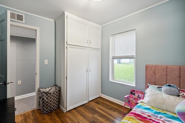 1818 W 9th St, Dixon, IL 61021 - bedroom with dark wood finished floors and baseboards