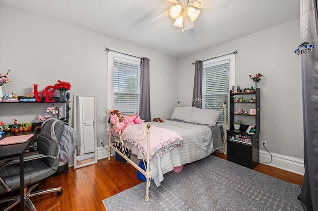 216 S Genoa St, Genoa, IL 60135 - bedroom featuring wood finished floors, baseboards, and a ceiling fan