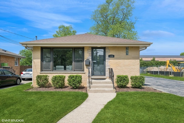 1208 N Dunton Ave, Arlington Heights, IL 60004 - bungalow-style house featuring brick siding and a shingled roof