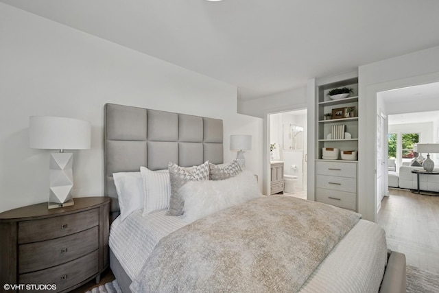 1208 N Dunton Ave, Arlington Heights, IL 60004 - bedroom featuring wood finished floors and ensuite bath