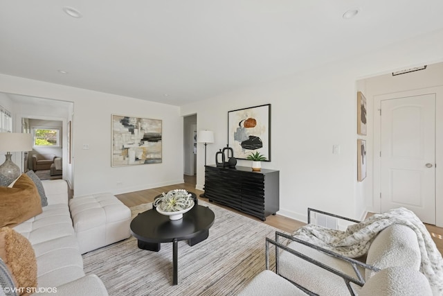 1208 N Dunton Ave, Arlington Heights, IL 60004 - living room featuring light wood finished floors, baseboards, and recessed lighting
