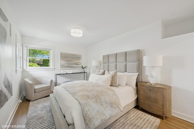 1208 N Dunton Ave, Arlington Heights, IL 60004 - bedroom featuring wood finished floors and baseboards