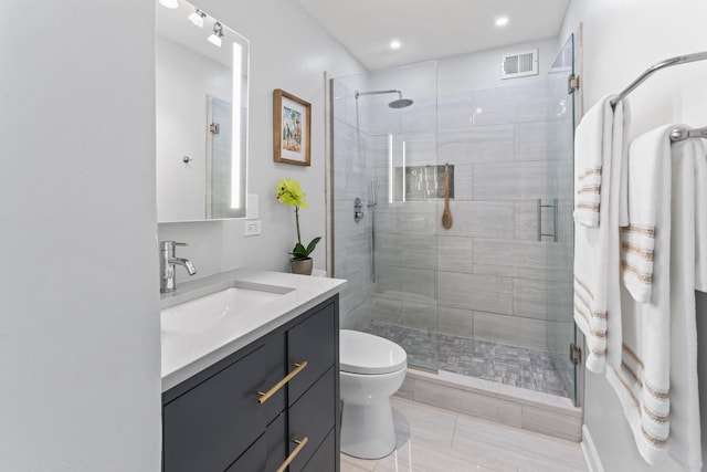 2700 N Hampden Ct Unit 24A, Chicago, IL 60614 - bathroom featuring vanity, toilet, a shower stall, recessed lighting, and tile patterned flooring