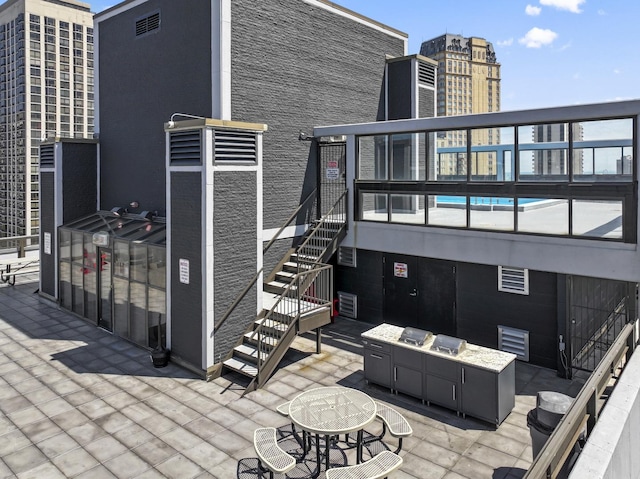 2700 N Hampden Ct Unit 24A, Chicago, IL 60614 - view of patio featuring stairway