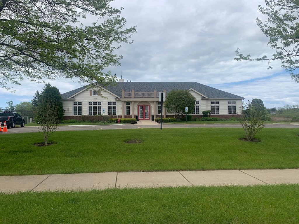 39510 N Cambridge Blvd, Beach Park, IL 60083 - ranch-style home with a front yard, french doors, and stucco siding