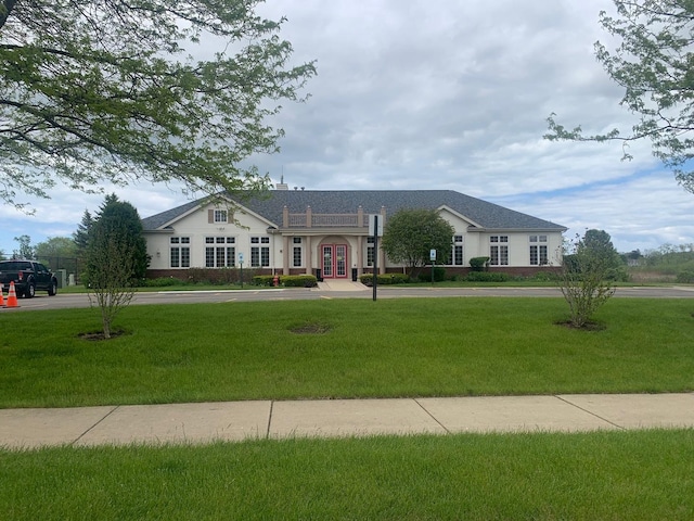 39510 N Cambridge Blvd, Beach Park, IL 60083 - ranch-style home with a front yard, french doors, and stucco siding