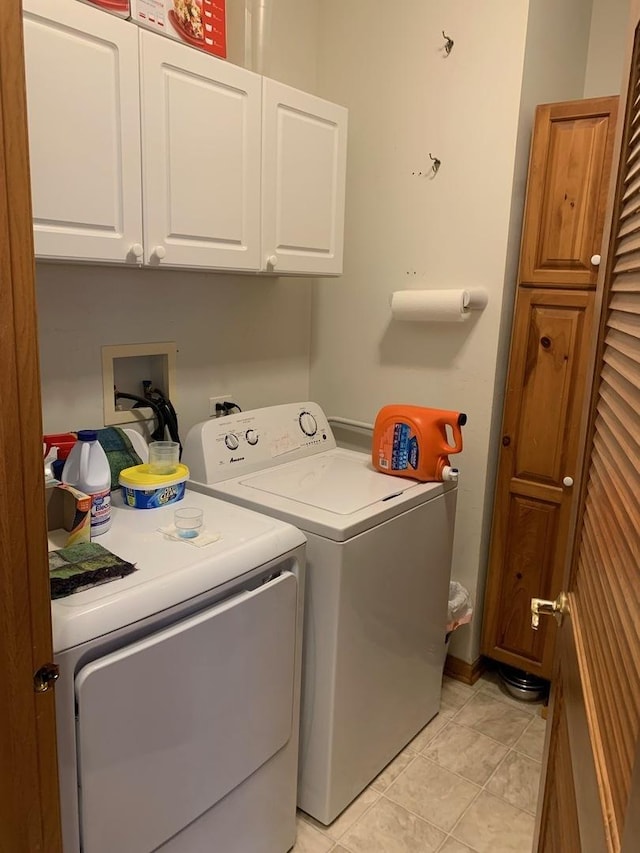 39510 N Cambridge Blvd, Beach Park, IL 60083 - laundry area with cabinet space, washing machine and dryer, and light tile patterned floors