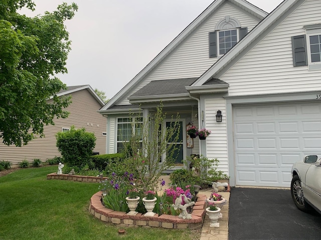 39510 N Cambridge Blvd, Beach Park, IL 60083 - traditional-style house featuring a front lawn and a garage