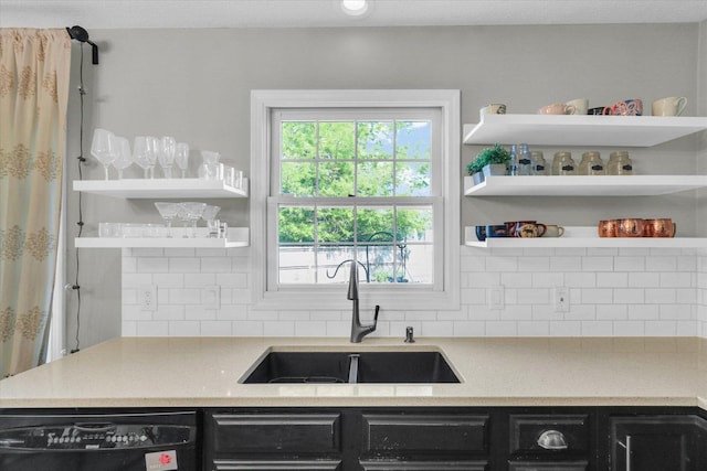 1517 Bridge Point Ln, Champaign, IL 61822 - kitchen featuring dishwasher, dark cabinetry, open shelves, and a sink
