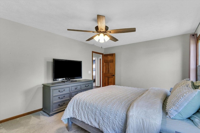 1517 Bridge Point Ln, Champaign, IL 61822 - bedroom with light carpet, baseboards, and a ceiling fan
