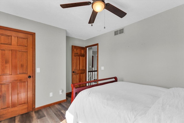 1517 Bridge Point Ln, Champaign, IL 61822 - bedroom with wood finished floors, baseboards, and a ceiling fan