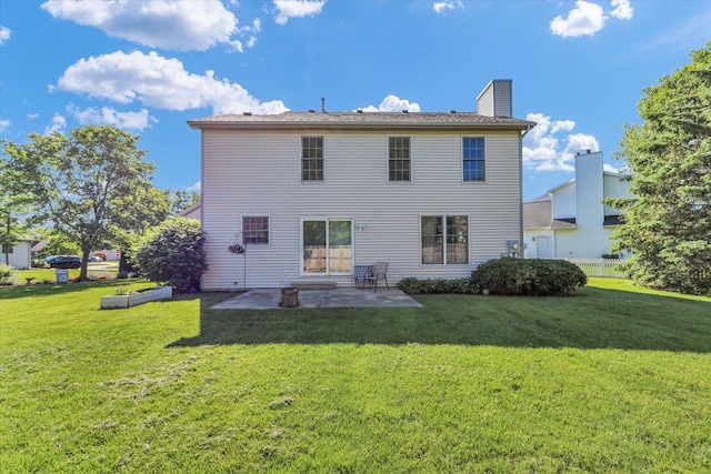 1517 Bridge Point Ln, Champaign, IL 61822 - back of property featuring a patio and a chimney