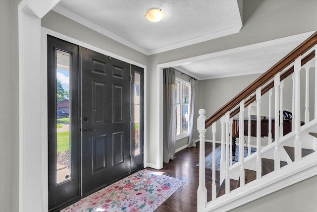 1517 Bridge Point Ln, Champaign, IL 61822 - entryway with stairway, dark wood-type flooring, baseboards, ornamental molding, and a textured ceiling
