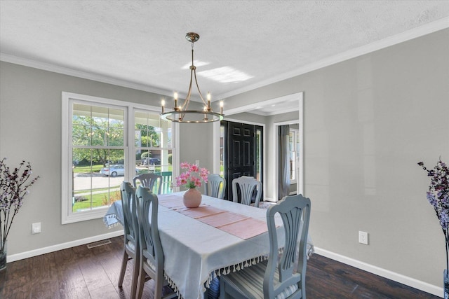 1517 Bridge Point Ln, Champaign, IL 61822 - dining area featuring a chandelier, crown molding, baseboards, healthy amount of natural light, and a textured ceiling